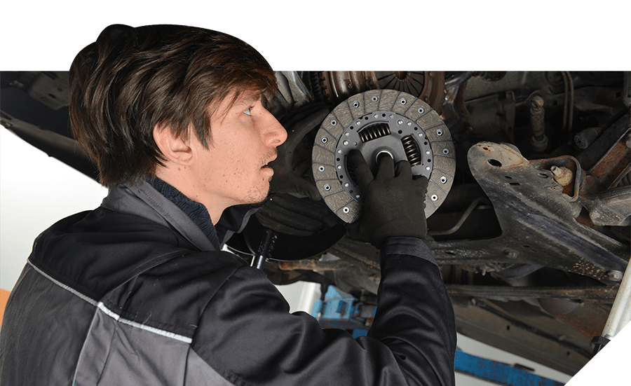 Mechanic holding a brake plate