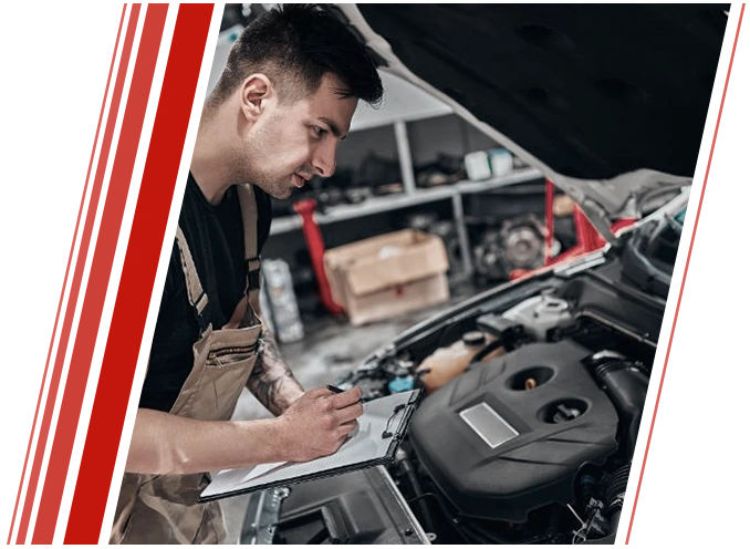 Mechanic Inspecting Car Engine