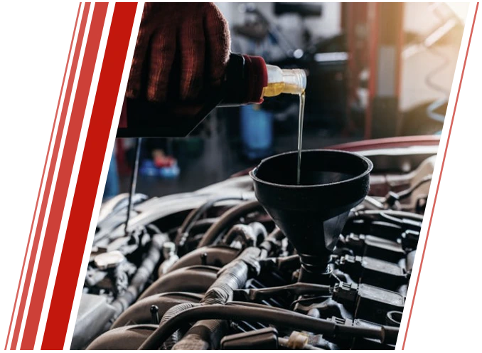 Mechanic Changing Car Engine Oil