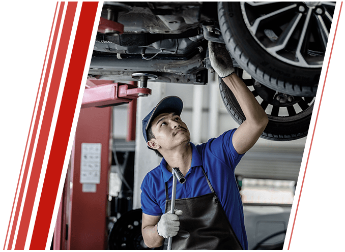 Mechanic Fixing Car Suspension