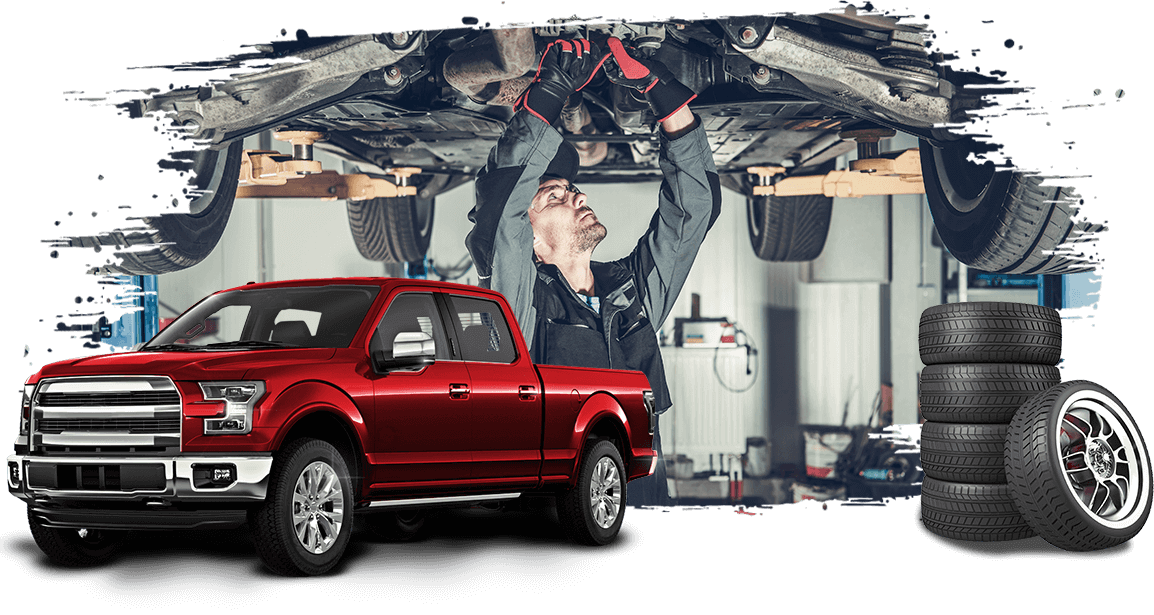 Red car with man working on truck