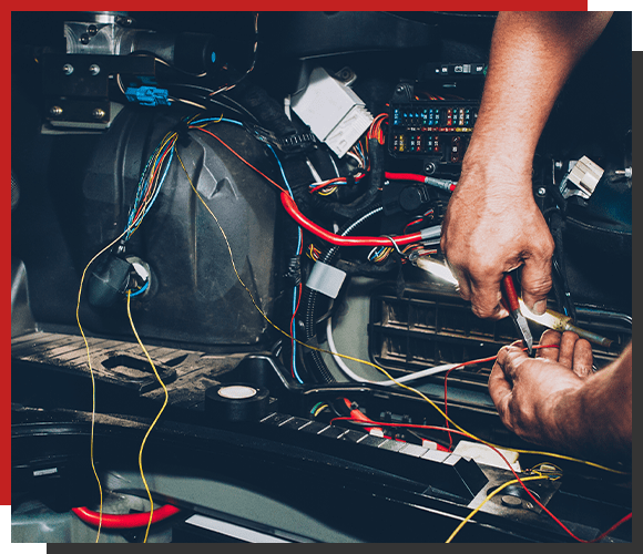 Mechanic electrician checking repairing upgrading wiring