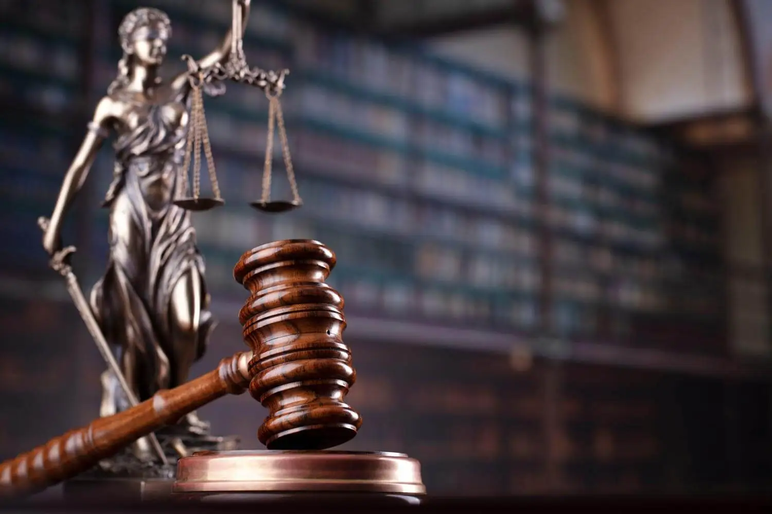 Judge's gavel on library background. Law and justice concept.