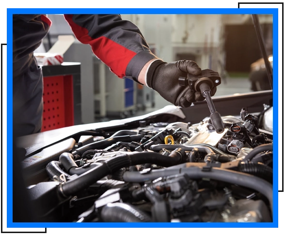 mechanic holding a tool