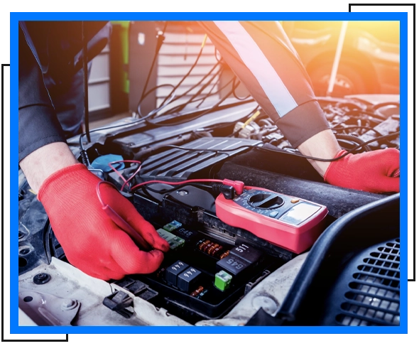 mechanic checking car electricity