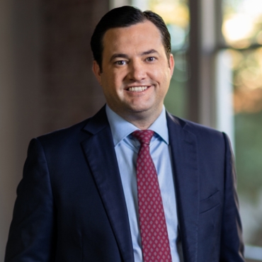 Justin C. Dewett