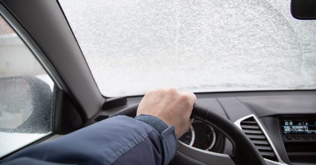 person wearing a winter coat sitting in the