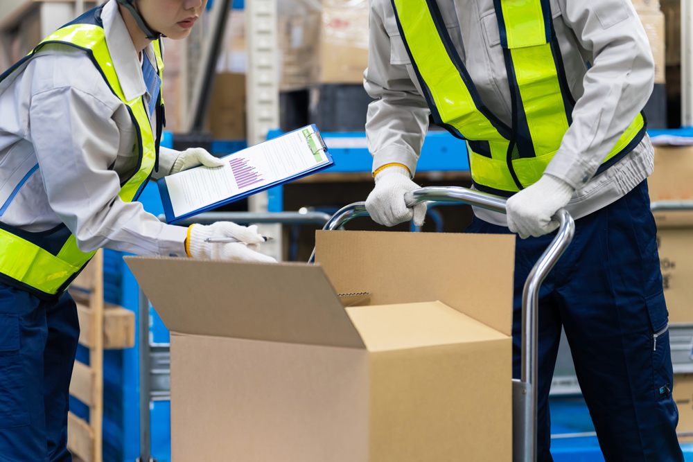 Worker inspecting luggage