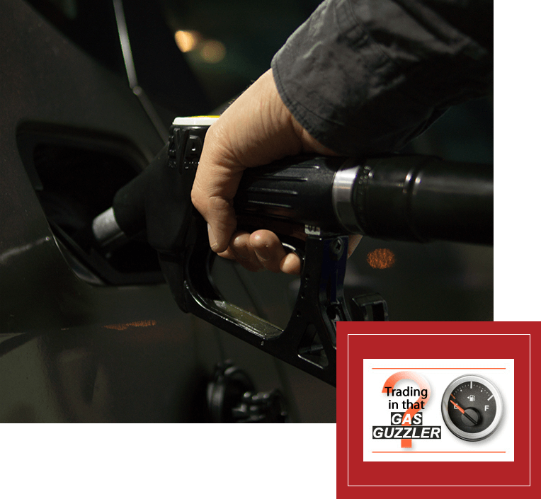 Hand of person holding gas hose, GasGuzzler