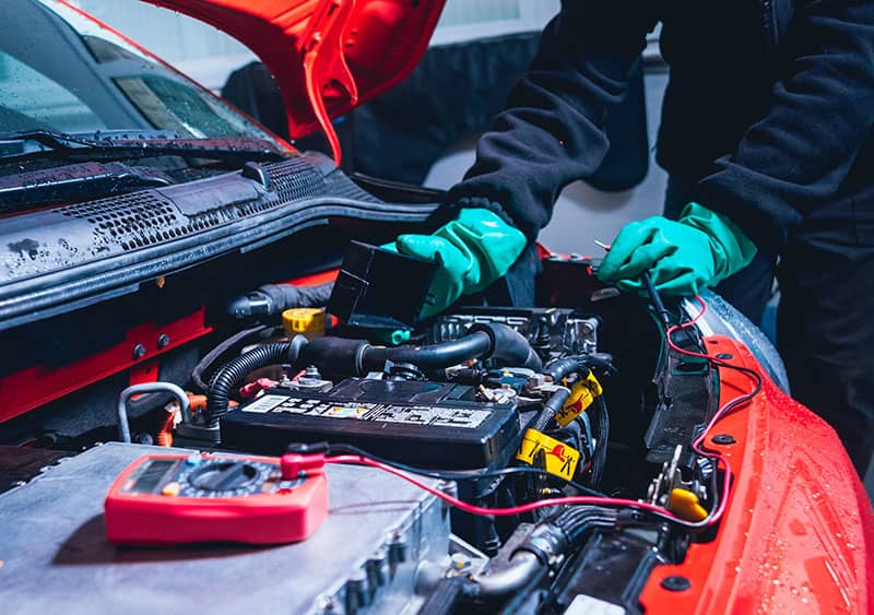 Mechanic Fixing Electrical Parts