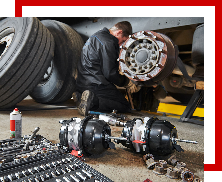 Man working on truck tires